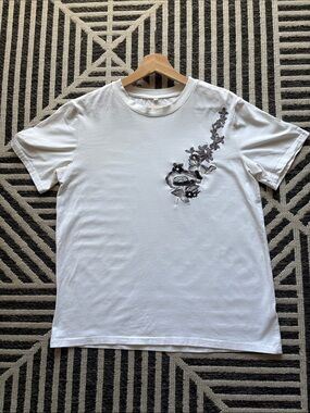 Men's White Short-Sleeve Tee with Embroidered Floral Accent